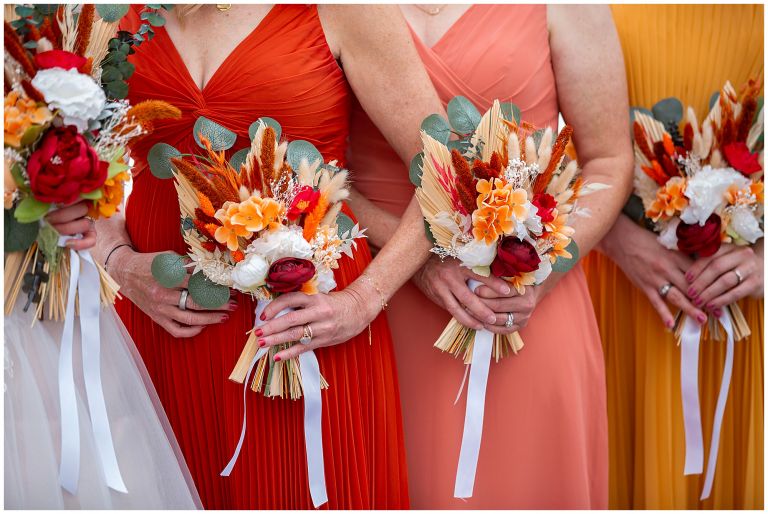 Bridesmaid bouquets of fall florals and colors