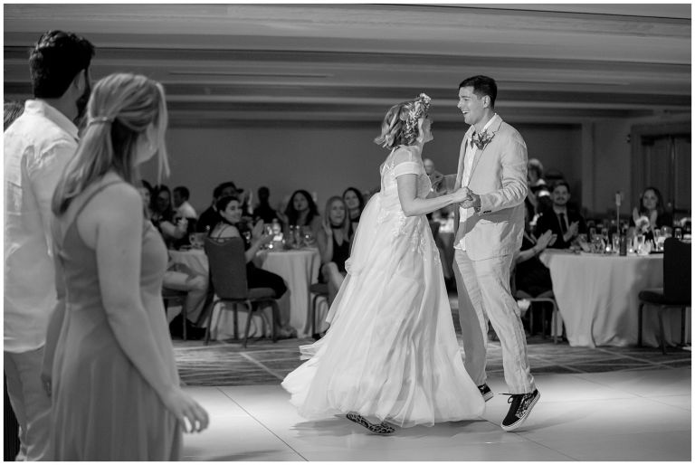 Bride and Groom dancing at wedding reception in black and white