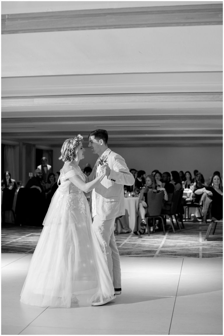 Bride and Groom dancing at wedding reception in black and white